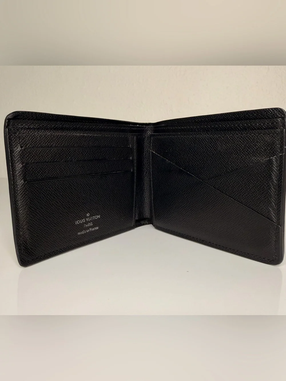 Authentic Louis Vuitton Black Epi Leather Bi-Fold Wallet